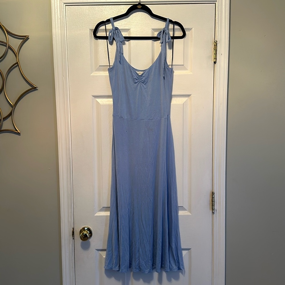 Light Blue A Line Dress. Size medium. With adjustable tie straps. Very stretchy.